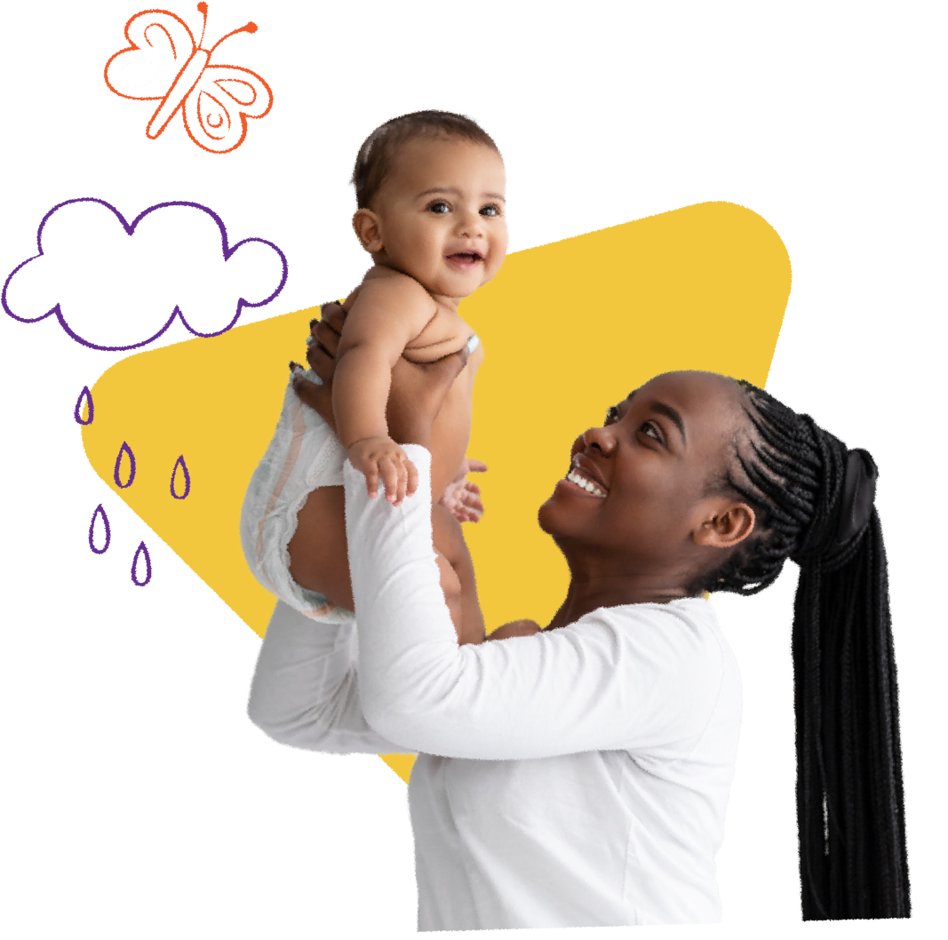 Parent joyfully lifting a laughing baby into the air